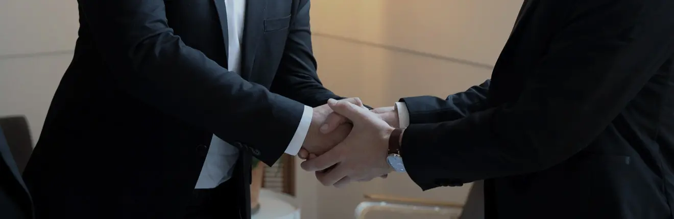 Business men shaking hands